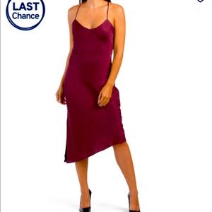 Cross cross back detail, adjustable shoulders straps. 51in long